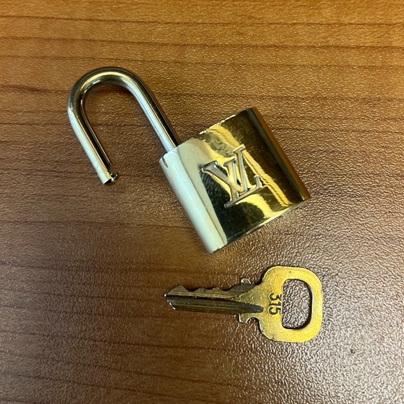 Louis Vuitton Accessories - Authentic Louis Vuitton 1 Lock and 1 Key - 315